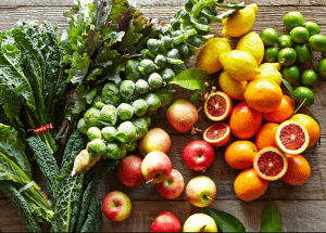 a group of fruits and vegetables on a wood surface Healthy Weight Loss Diets Renfrew